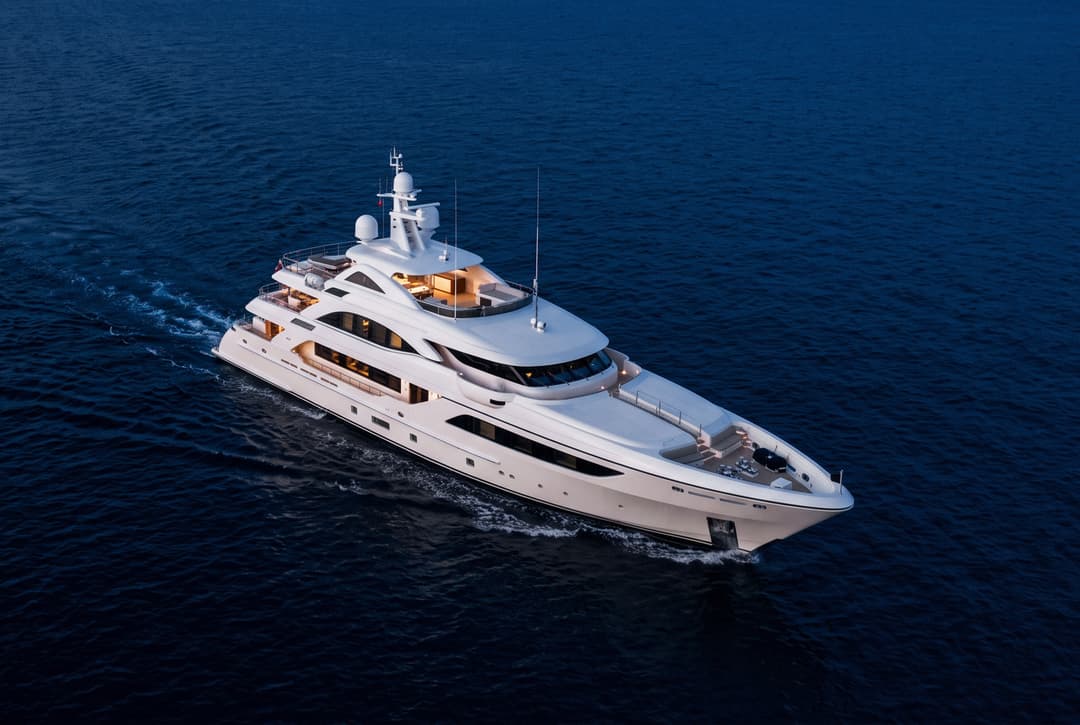 A superyacht under way at dusk, seen from above